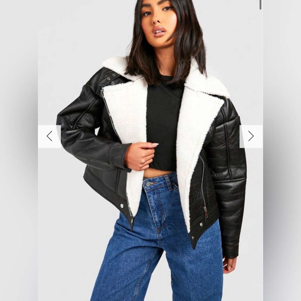 Borg lined aviator black jacket. Faux fur lined collar. Brand new with tags.